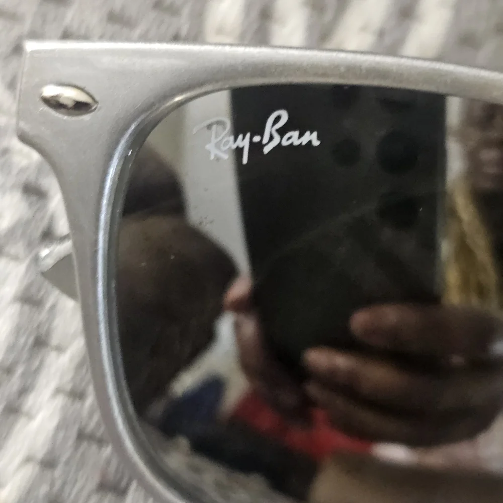 Ray-Ban Women's Silver Frame Sunglasses with Black Case